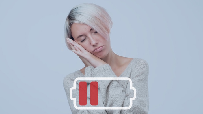 Kvinne med lavt batteri, illustrasjonsbilde på fatigue