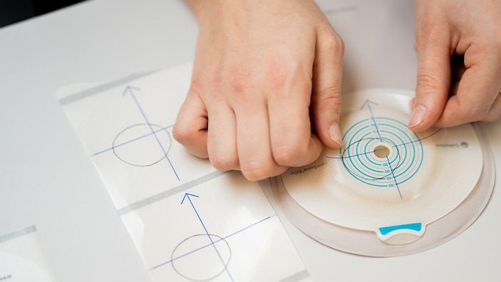 Coloplast stomiplate i klippemaskinen
